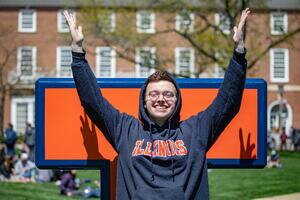 Student in front of a block I