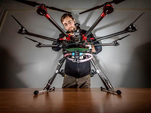 Student working on a drone