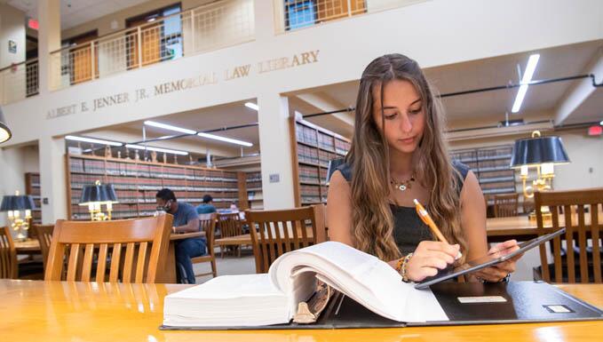 Student working in the law library