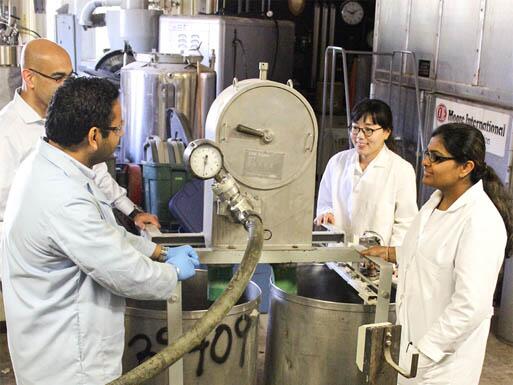 Students working with machinery