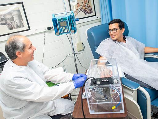 Student getting examined in a lab
